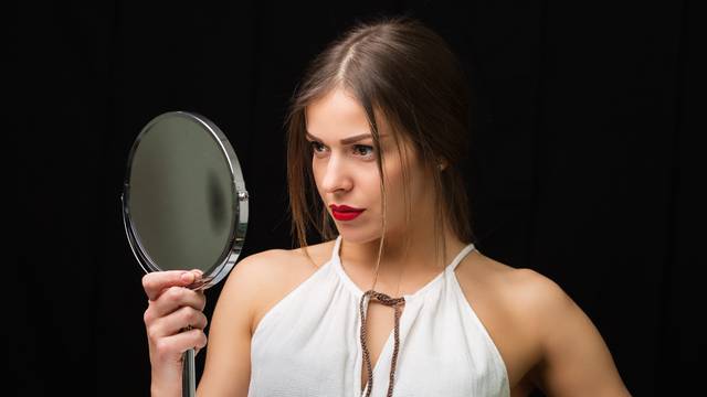 Woman with a mirror