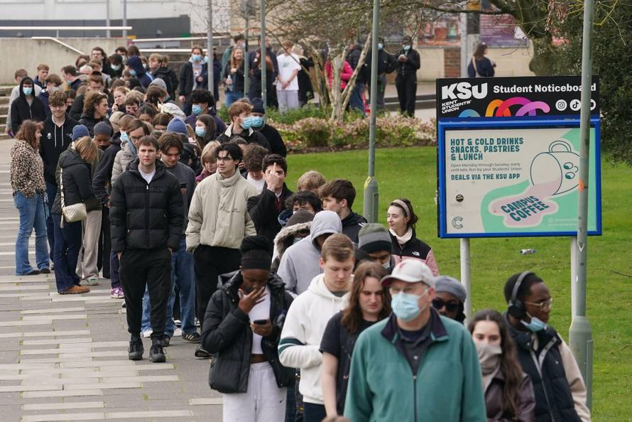 Students queuing for antibiotics outside a building at the University of Kent in Canterbury. The university have confirmed that a student was one of two people who have died as a result of meningitis in the area. The UK Health Security Agency (UKHSA) said