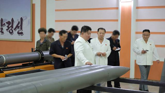 North Korea's Kim Jong Un visits key military factories including missile plant