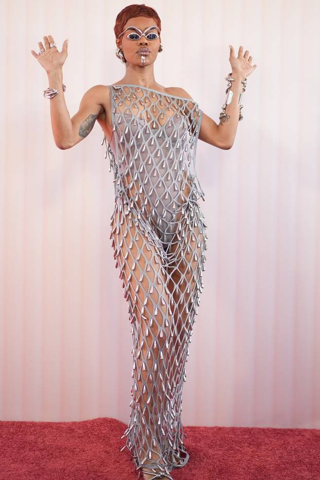 Actress Teyana Taylor In Outer Space Look With Cutout Dress Over Swimsuit And Futuristic  Makeup At Revolvefest - 11 Apr 2026