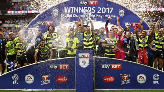Huddersfield Town celebrate with the trophy after winning the Sky Bet Championship Play-Off Final and getting promoted to the Premier League