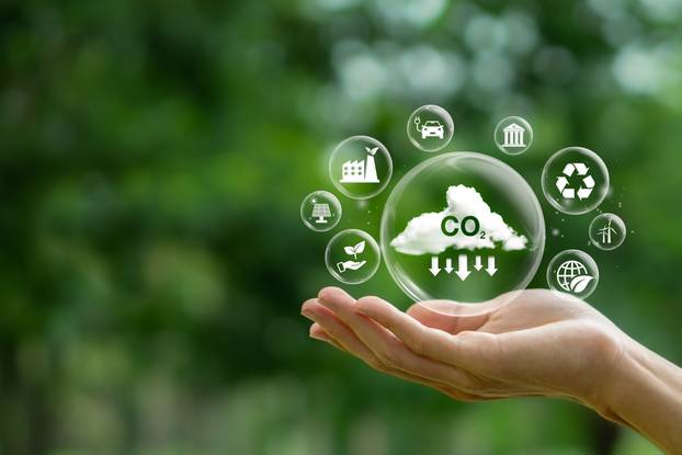 Reduce,Co2,Emission,Concept.hand,Holding,Bubbles,With,Co2,Emissions,Icon