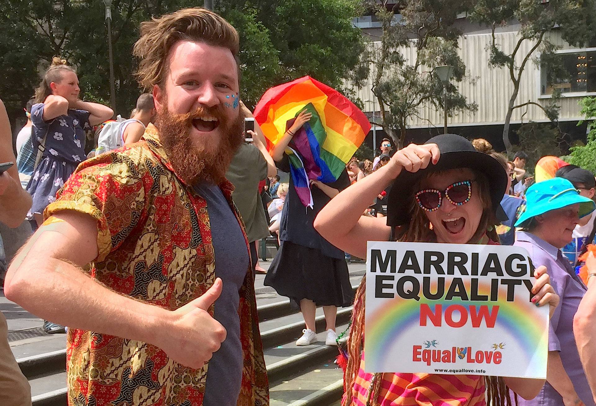  Supporters of the 'Yes' vote react as they celebrate after it was announced the majority of Australians support same-sex marriage in a national survey, at a rally in Sydney