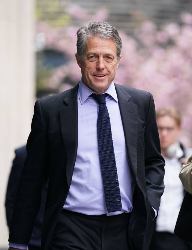 Hugh Grant says he is 'determined' to get 'justice' from tabloids