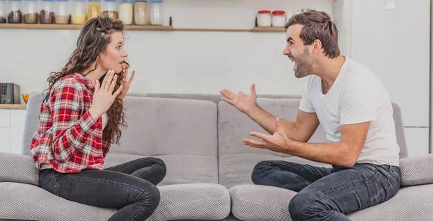 Negative emotions are a couple of concepts. A husband and wife, asserting and shouting expressive and emotional pairs having an argument or quarrel at home.