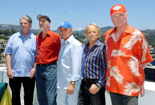 FILE PHOTO: Beach Boys members Brian Wilson, David Marks, Bruce Johnston, Al Jardine and Mike Love appear together for the first time in ten years on the rooftop of Capitol Records in Los Angeles