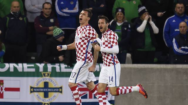 Croatia's Mario Mandzukic celebrates scoring their first goal with Duje Cop