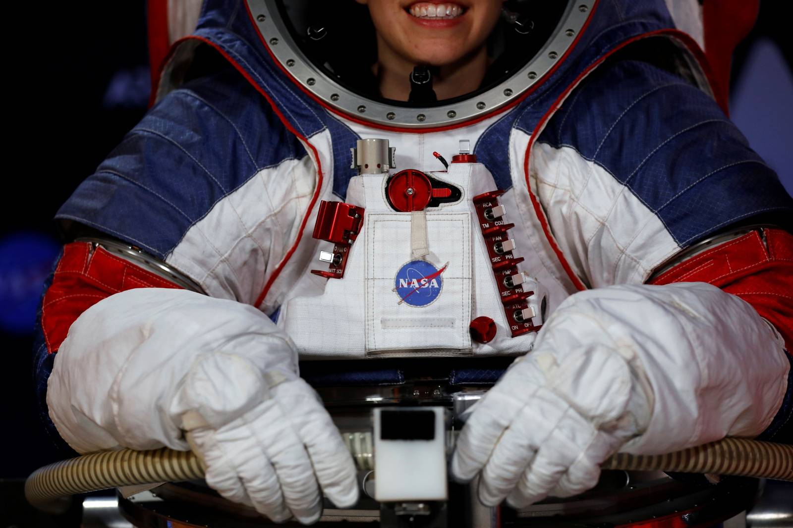 Advanced Space Suit Engineer at NASA Kristine Davis wears the xEMU space suit for the next astronaut to the moon by 2024,  during its presentation at NASA headquarters in Washington