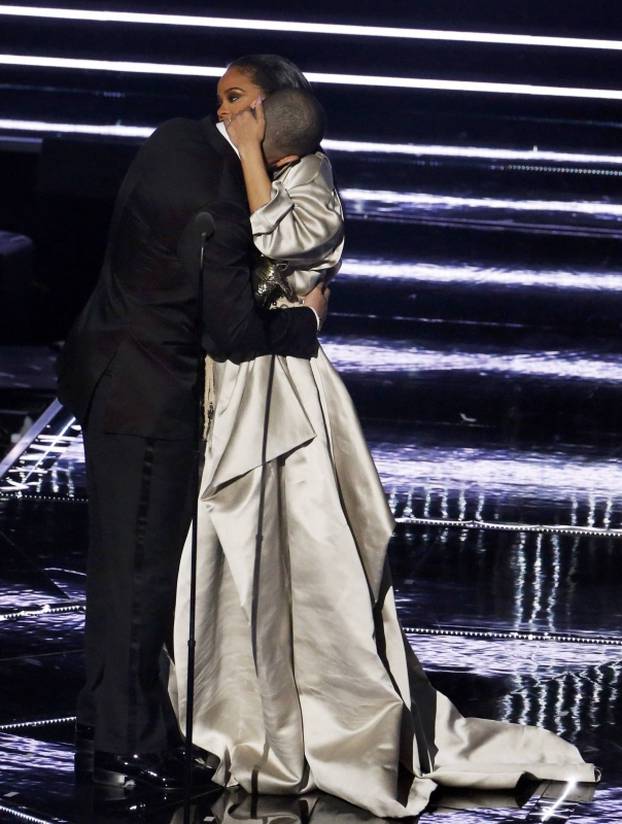 Drake presents Rihanna with an award during the 2016 MTV Video Music Awards in New York