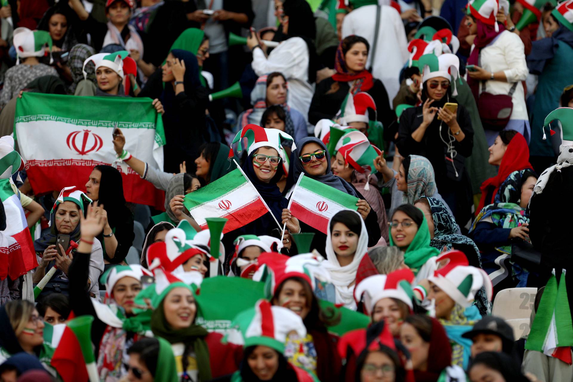 Iranian women fans attend Iranâs FIFA World Cup Asian qualifier match against Cambodia, as for the first time women are allowed to watch the national soccer team play in over 40 years, at the Azadi stadium in Tehran