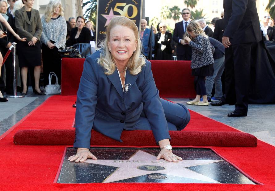 FILE PHOTO: Ladd touches her star on the Walk of Fame in Hollywood