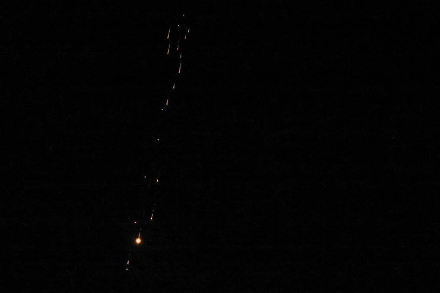 A projectile that was heading towards Israel and launched from Iran is intercepted, as seen from Ramallah