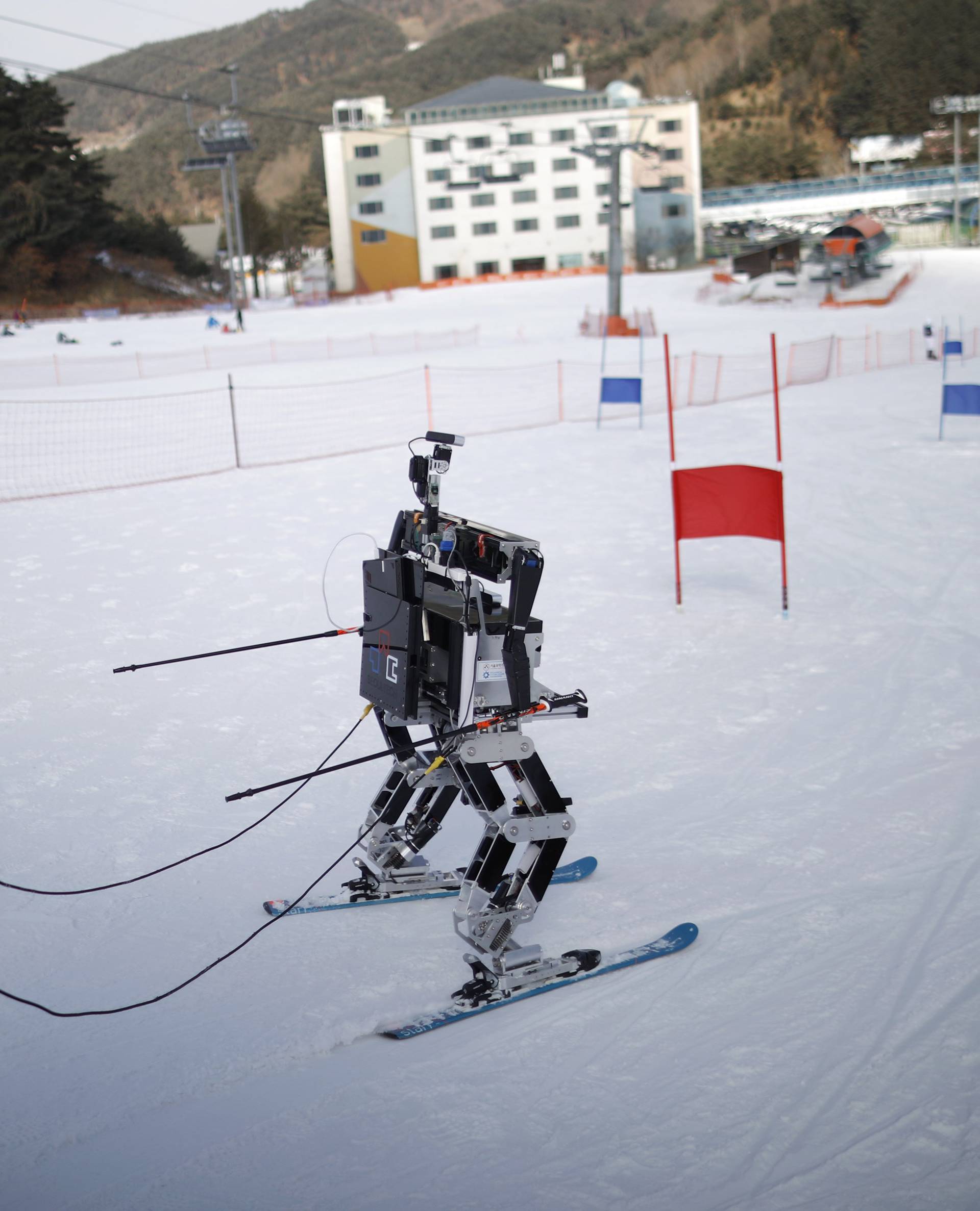 A robot skis during practice at the Ski Robot Challenge at a ski resort in Hoenseong
