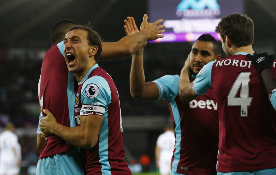 West Ham United's Winston Reid celebrates scoring their second goal with team mates