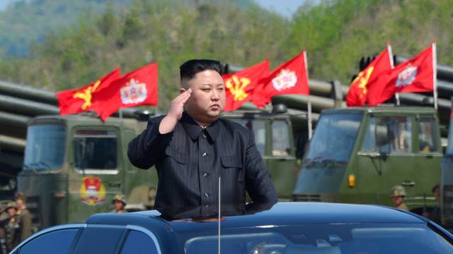 FILE PHOTO: North Korea's leader Kim Jong Un watches a military drill marking the 85th anniversary of the establishment of the Korean People's Army