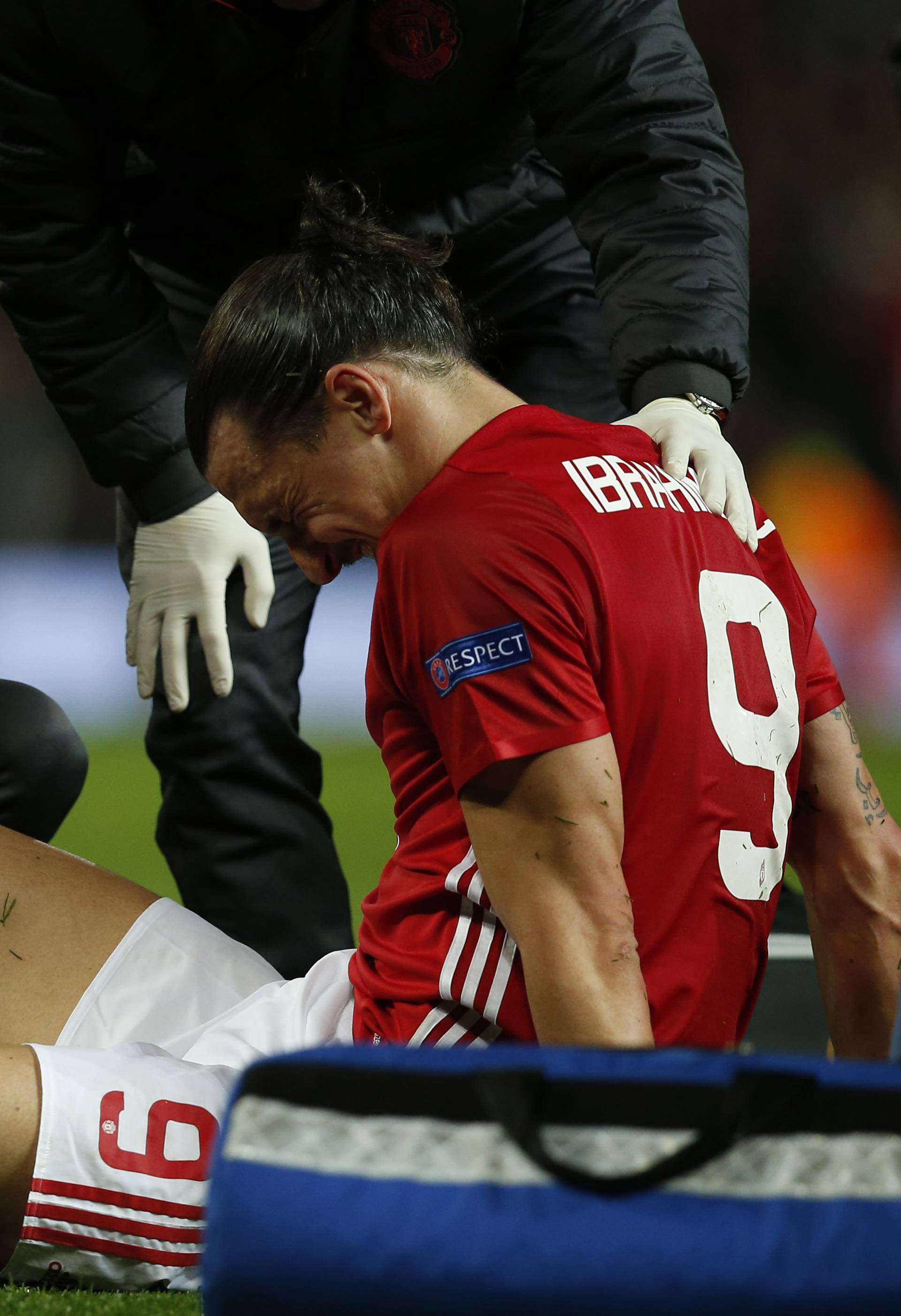 Manchester United's Zlatan Ibrahimovic receives medical attention after sustaining an injury