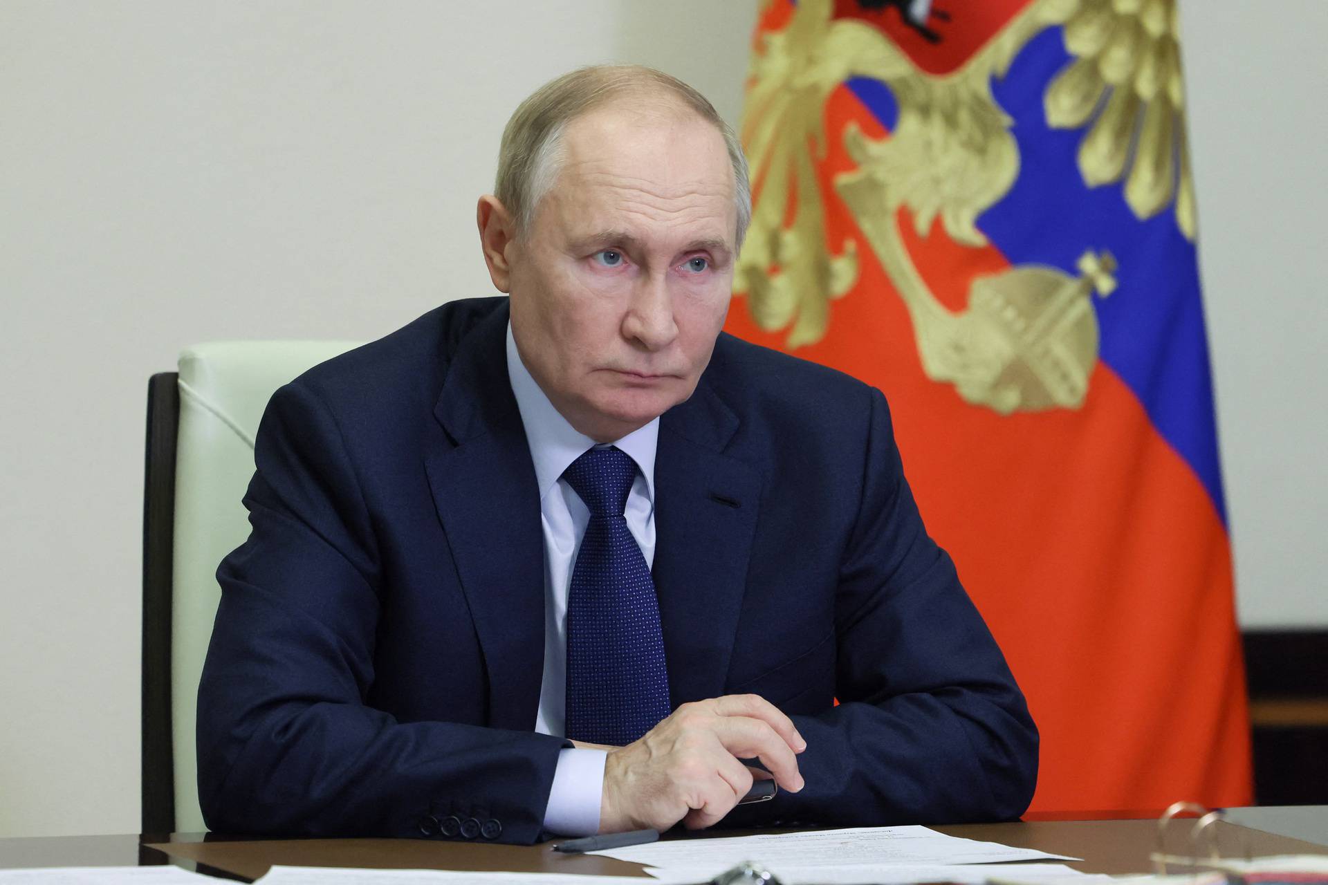 Russian President Putin chairs a meeting with members of the government, outside Moscow