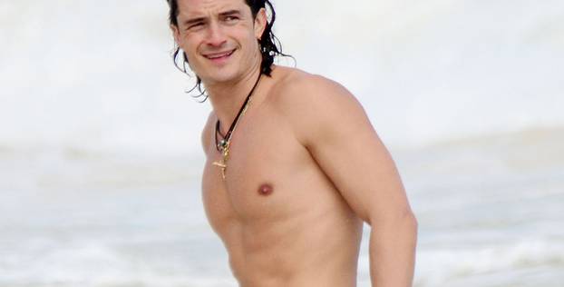 Ladies man Orlando Bloom holidays in Cancun