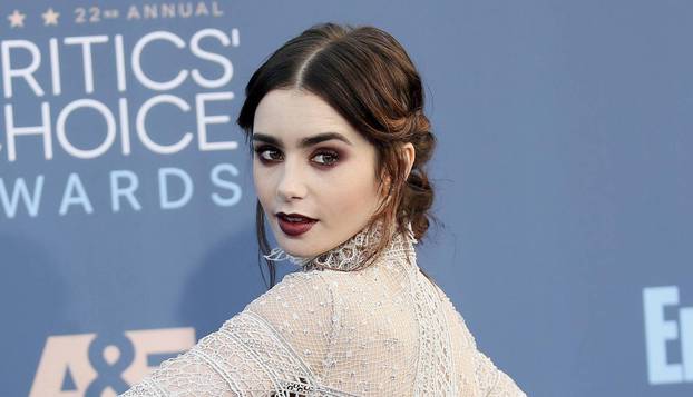 Lily Collins arrives at the 22nd Annual Critics