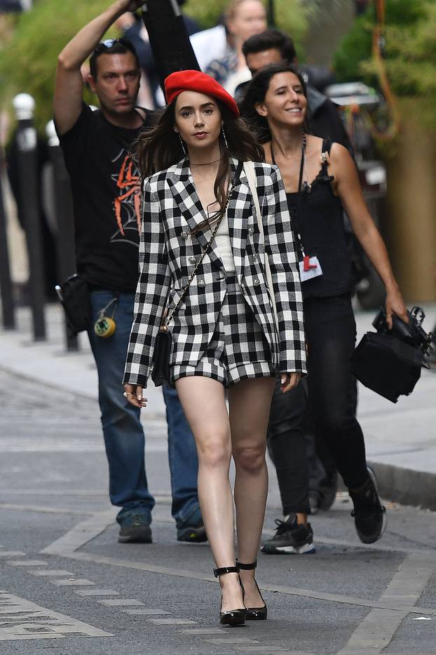 Lily Collins and Philippine Leroy Beaulieu shooting Emily in Paris on Day 3
