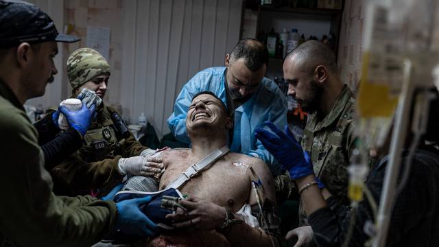 Ukrainian army medics treat the wounded in Donetsk Oblast