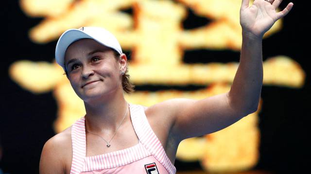 FILE PHOTO: Australia's Ashleigh Barty waves to spectators after winning the match against China's Wang Yafan