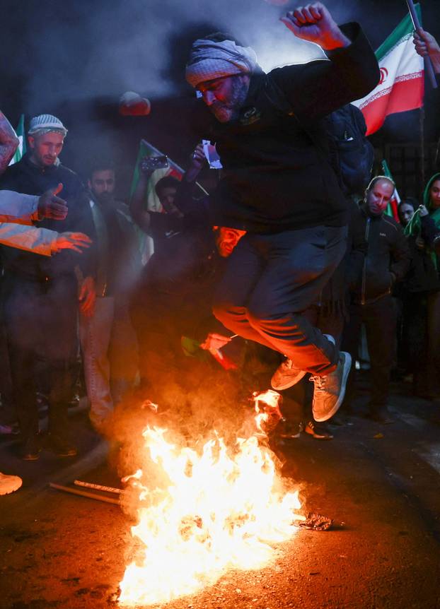 People gather after a two-week ceasefire in the Iran war was announced, in Tehran