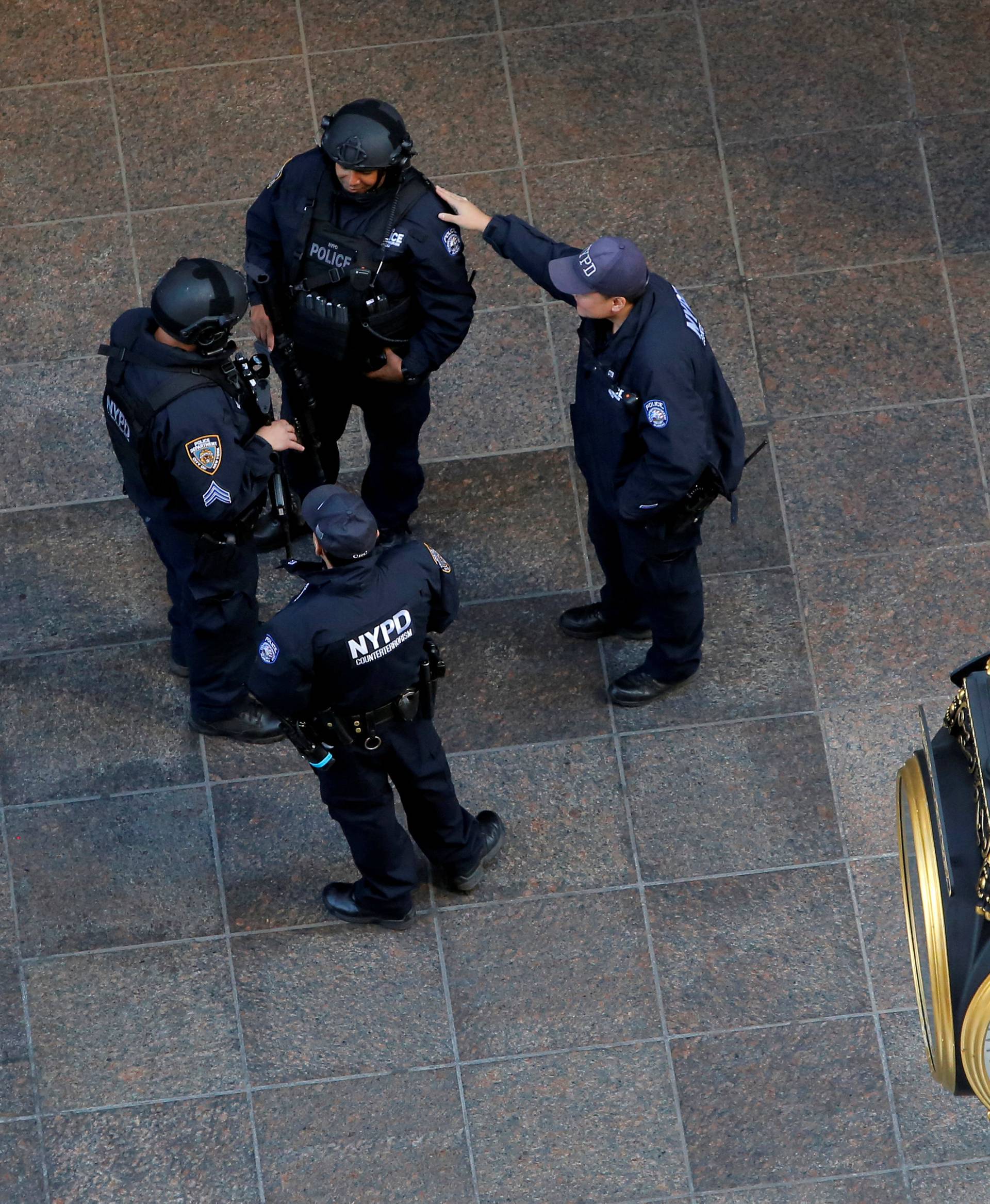 Members of the New York Police Department's Counterterrorism Bureau stand guard outside Republican presidential nominee Donald Trump's Trump Tower in Manhattan, New York, U.S.