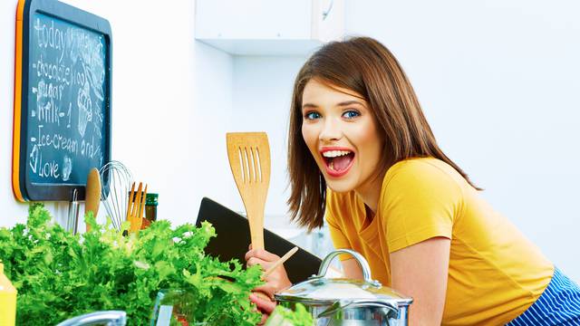 Woman cooking with fun.
