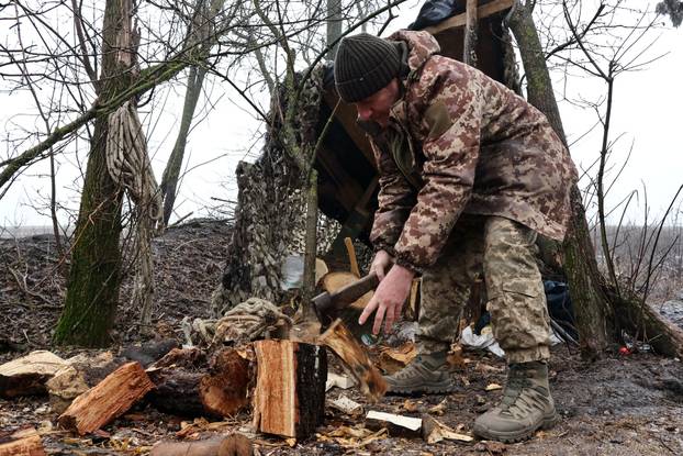 Ukrainian service member rest after a combat mission near a frontline, in Zaporizhzhia region