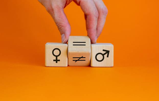 Symbol,For,Gender,Equality.,Hand,Turns,A,Cube,And,Changes