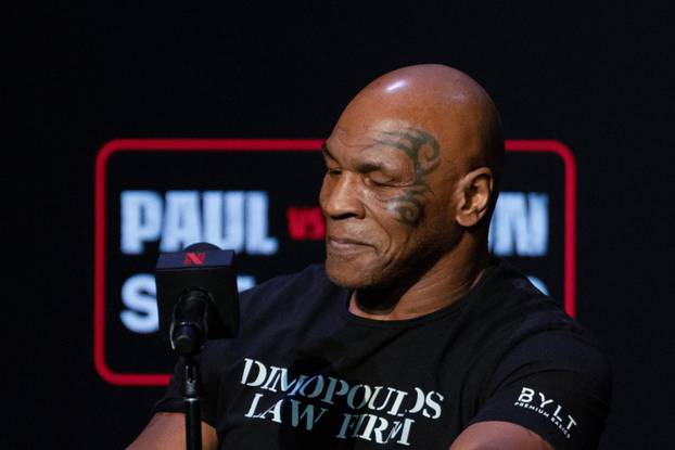 Boxers Mike Tyson and Jake Paul attend a news conference in New York