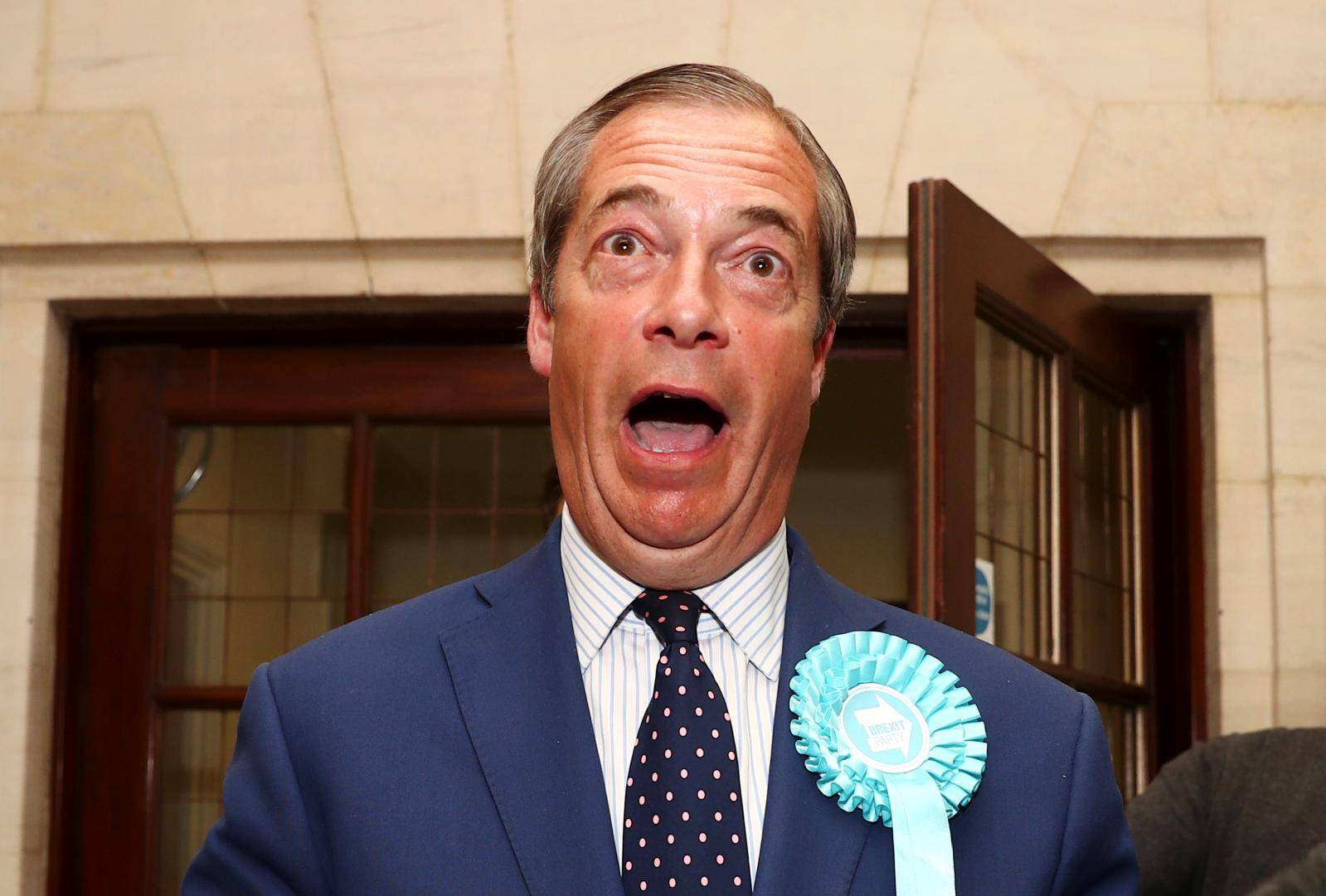 Brexit Party leader Nigel Farage speaks to the media outside the counting centre for the European Parliamentary election in Southampton