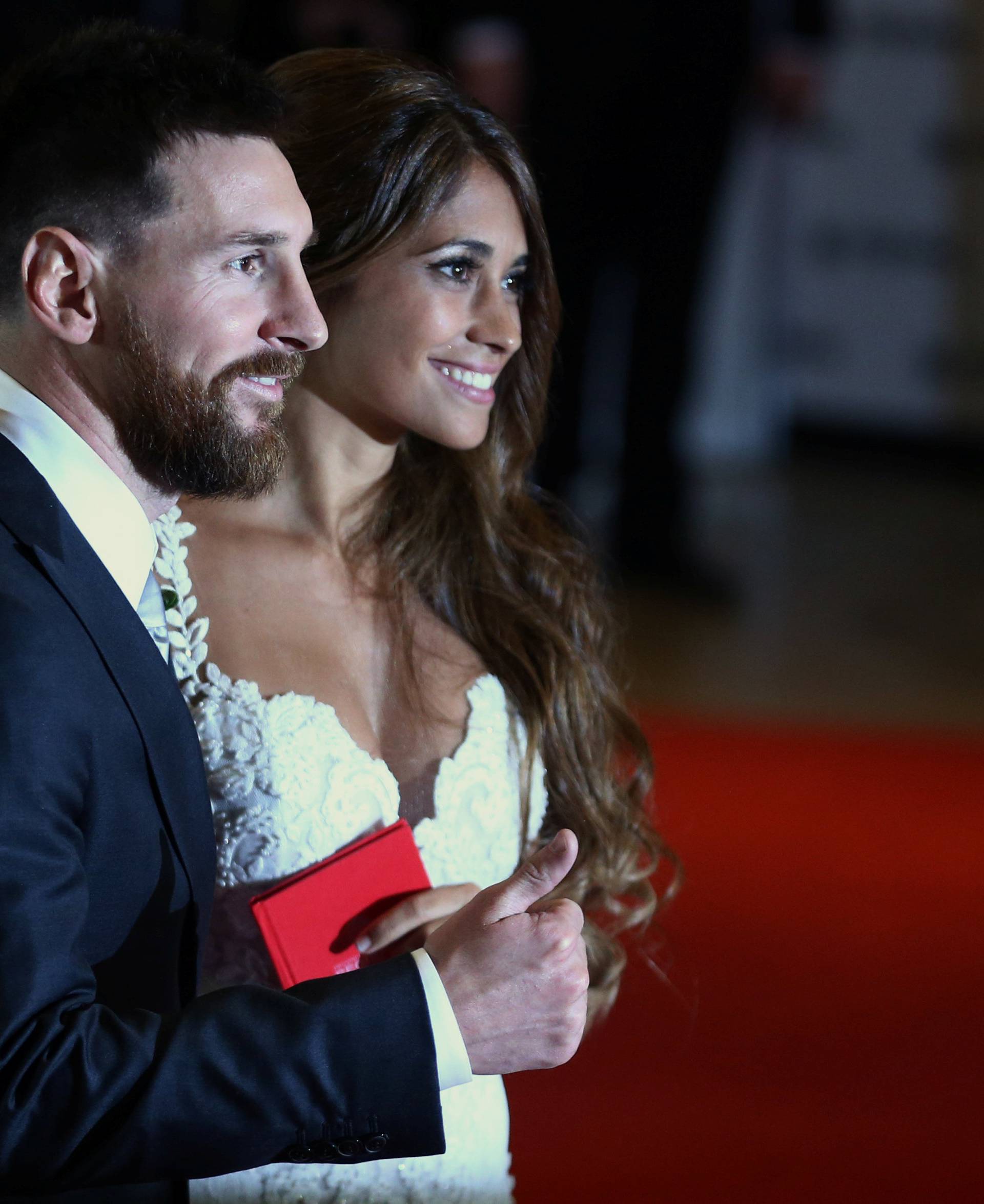 Argentine soccer player Lionel Messi and Antonela Roccuzzo pose at their wedding in Rosario