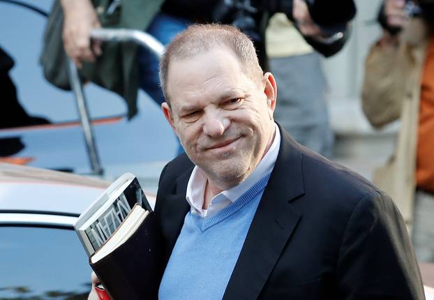 Film producer Harvey Weinstein arrives at the 1st Precinct in Manhattan in New York