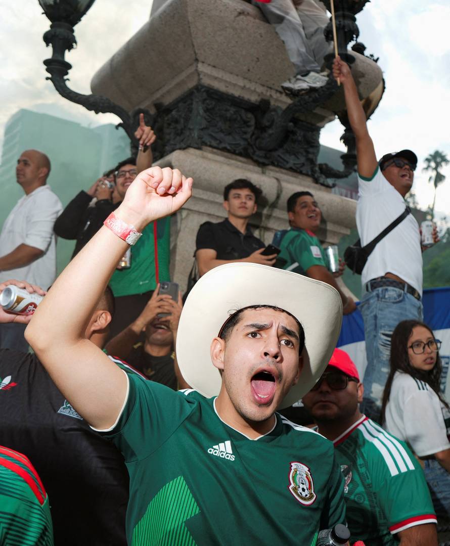 People celebrate Mexico's victory in the opening match of the 2026 FIFA World Cup, in Mexico City