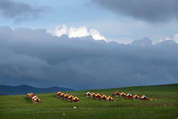 Cabins for tourists are seen on the grasslands on the outskirt of Ulaanbaatar