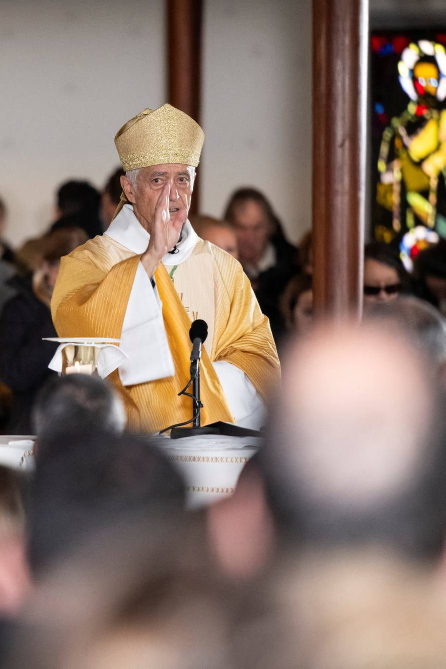 Sunday Mass at the chapel of Saint-Christophe dedicated to the victims of the fire at the 'Le Constellation' bar and lounge