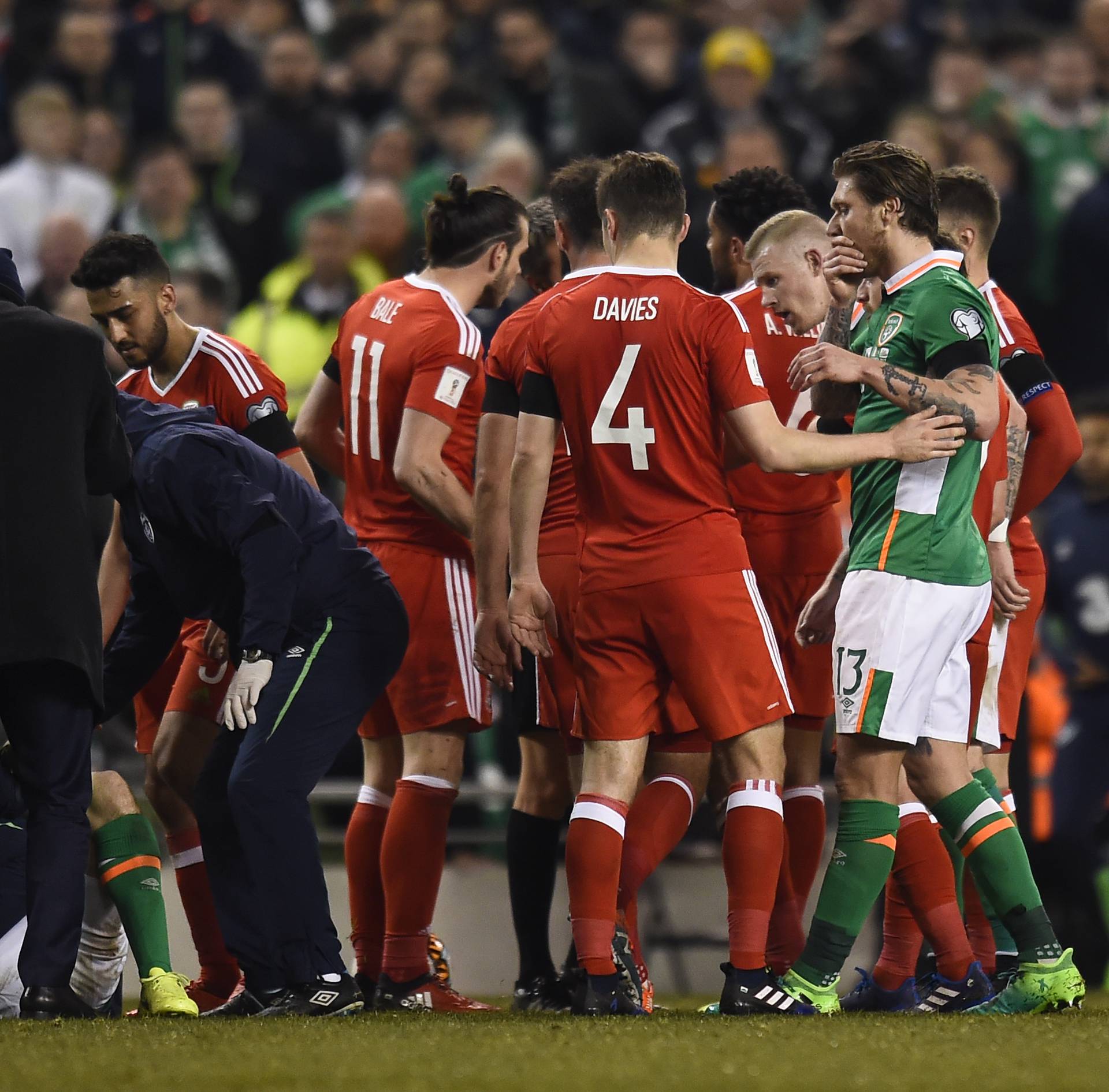 Republic of Ireland's Seamus Coleman receives medical attention