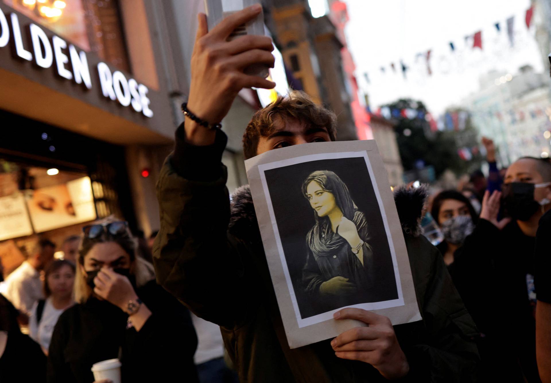 People march in solidarity with women in Iran following the death of Mahsa Amini, in Istanbul