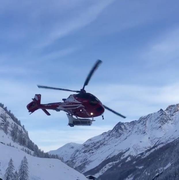 An Air Zermatt helicopter takes off in Zermatt