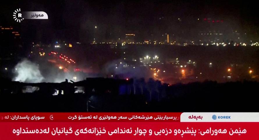 Smoke rises from a missile attack in Erbil