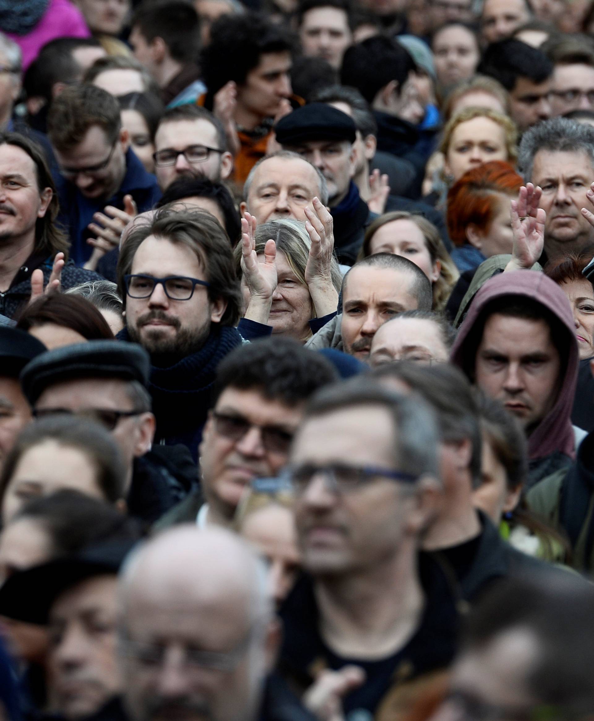 People attend a protest rally in reaction to the murder of Slovak investigative reporter Jan Kuciak and his fiancee Martina Kusnirova, in Bratislava
