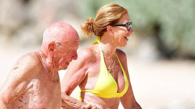 *PREMIUM-EXCLUSIVE* *MUST CALL FOR PRICING* The Australian-American business magnate Rupert Murdoch laps up the hot Caribbean sunshine with his scantily-clad mystery woman and billionaire pal Anthony Bamford out on the beaches of Barbados.