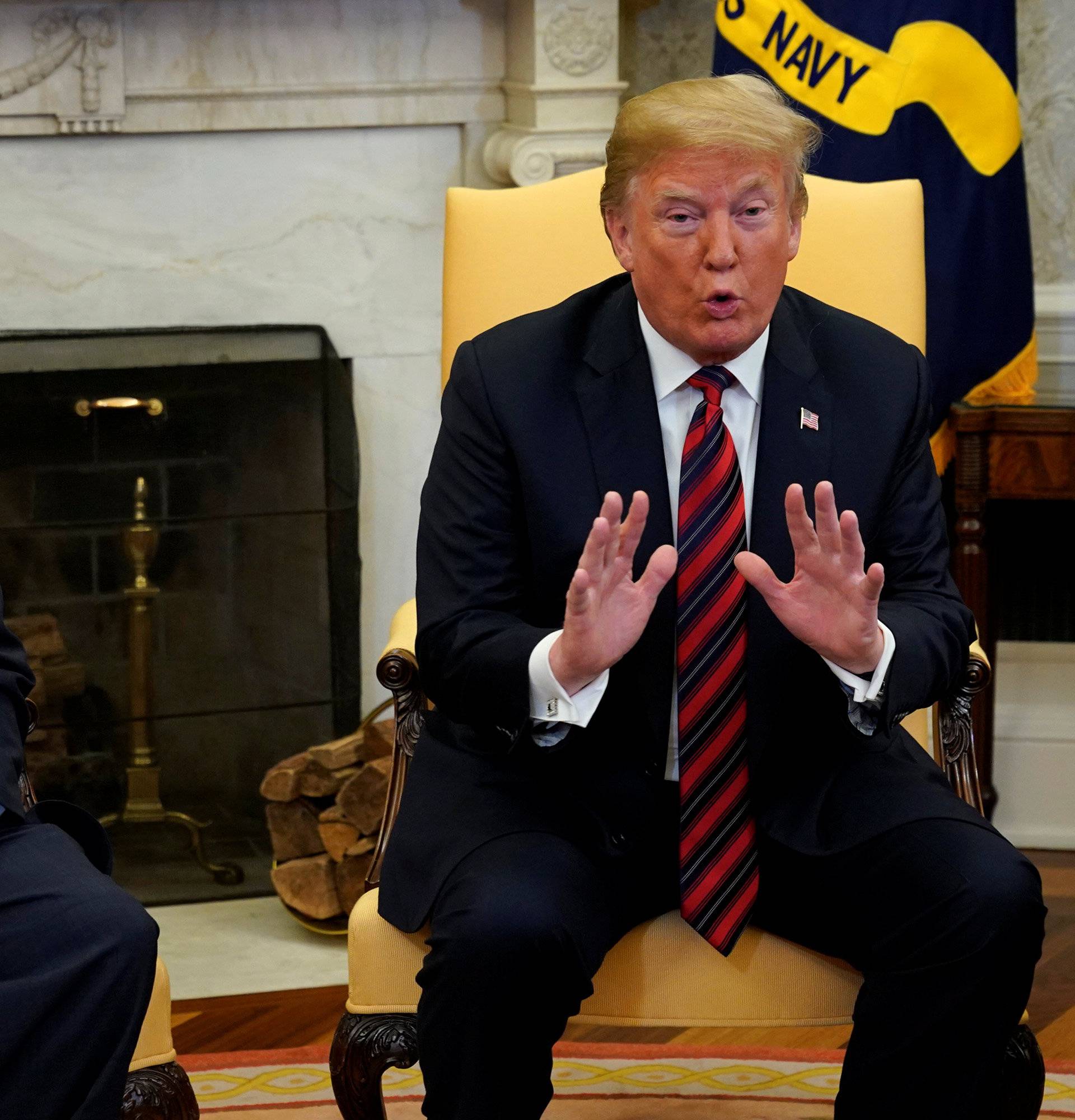 U.S. President Donald Trump talks to the media as he greet Josh Holt, an American missionary who was released by Venezuela, in the Oval Office of the White House in Washington