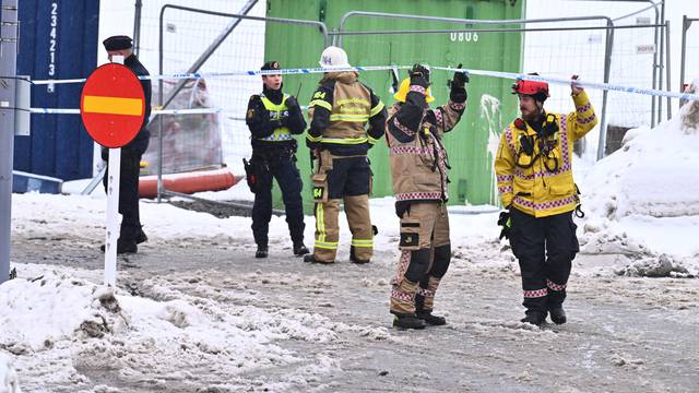 Emergency services work following a construction lift accident in Sundbyberg, north of Stockholm