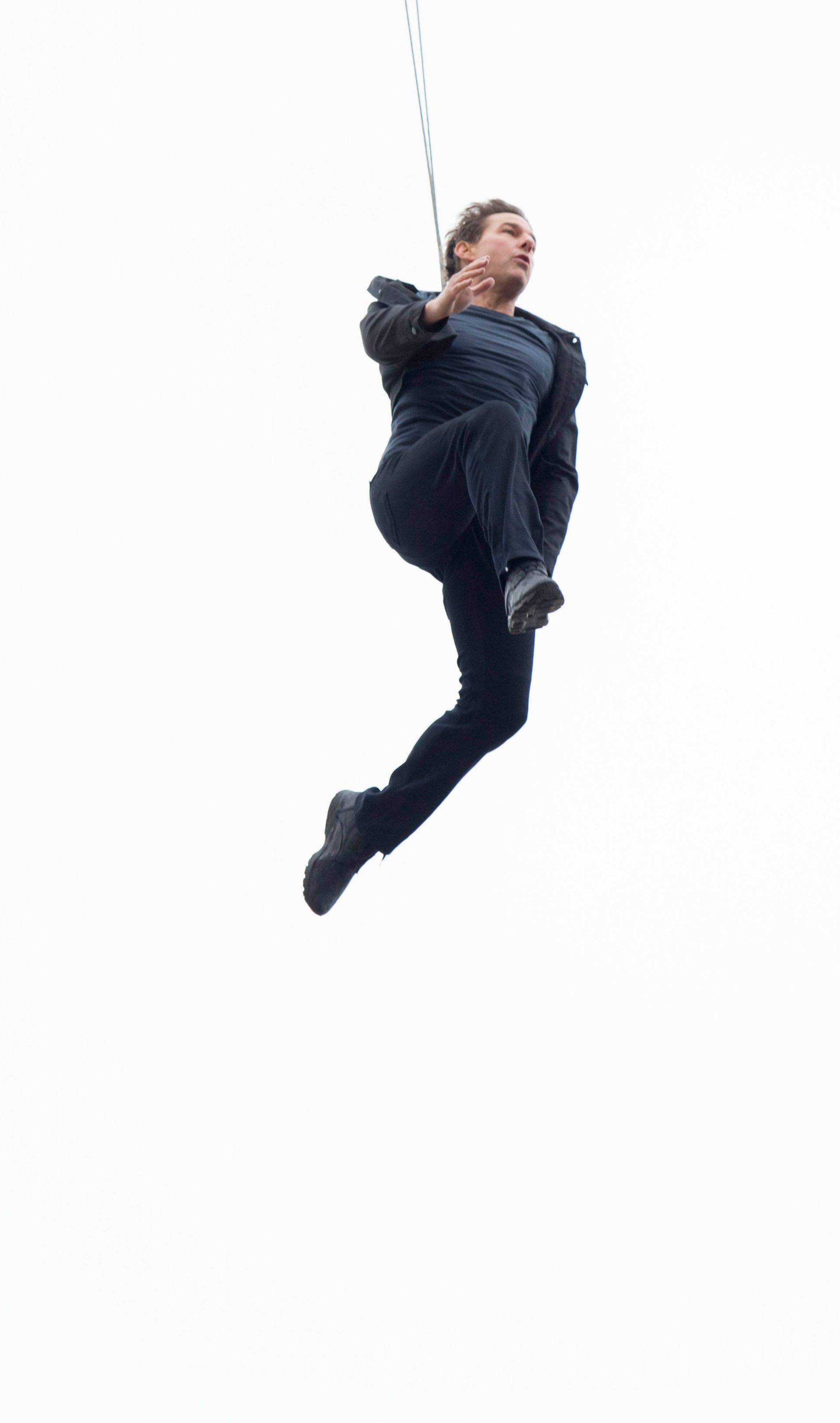 Tom Cruise jumps from the top of  St. Pauls Cathedral filming Mission Impossible - Fallout in Central London