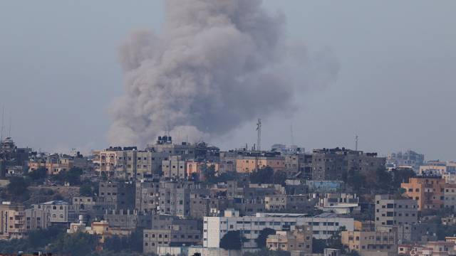 Smoke rises after Israeli air strikes in Gaza, as seen from southern Israel