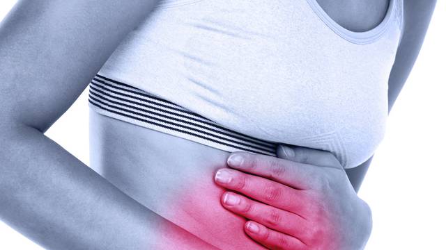 Stomach abdomen pain - woman having abdominal pain