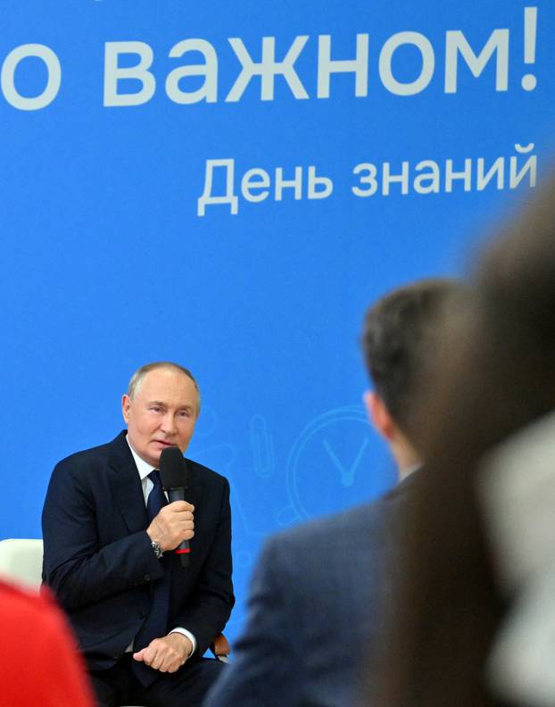 Russian President Putin delivers a lesson at Kyzyl school